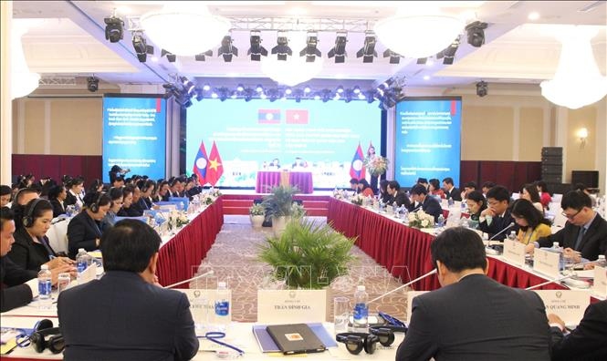 Vietnam, Laos NA agencies share work experience in Dong Hoi